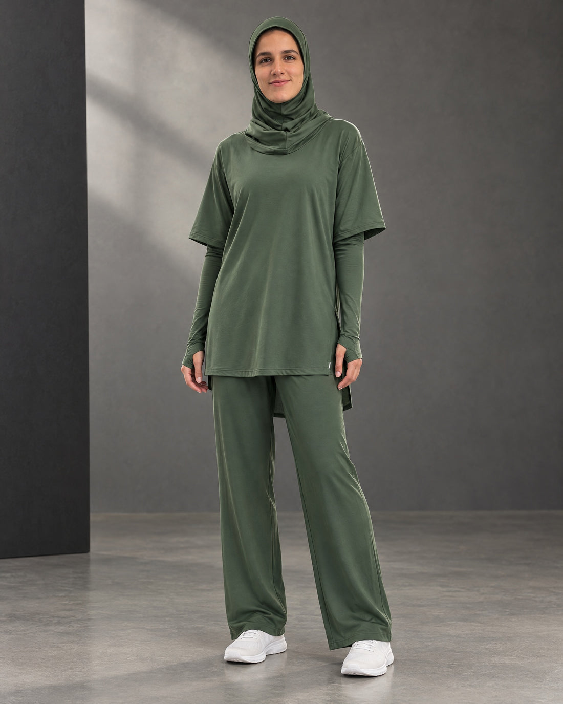 Olive top and pants worn without the included removable hip cover. Hijab sold separately.